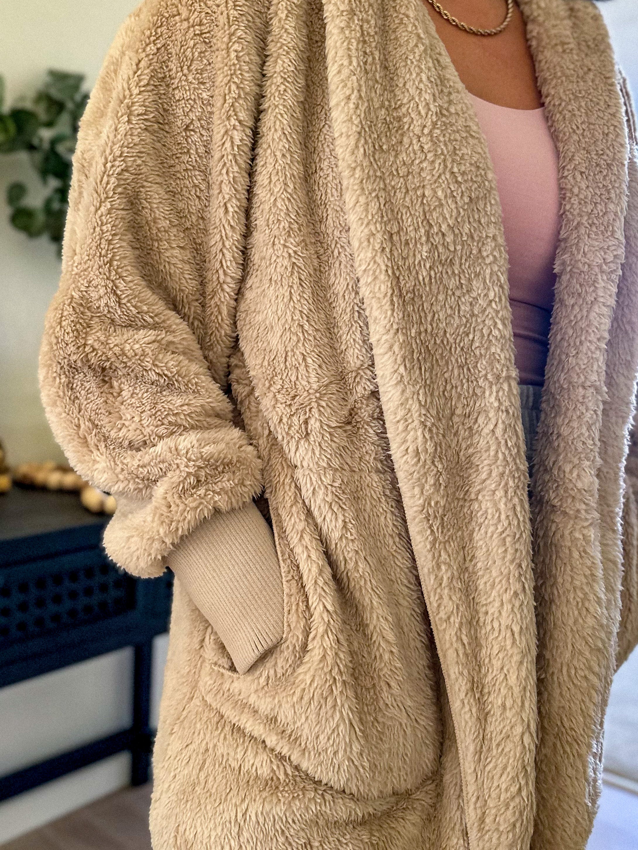 women's beige teddy bear soft, cozy, and fuzzy longer robe jacket with a hood