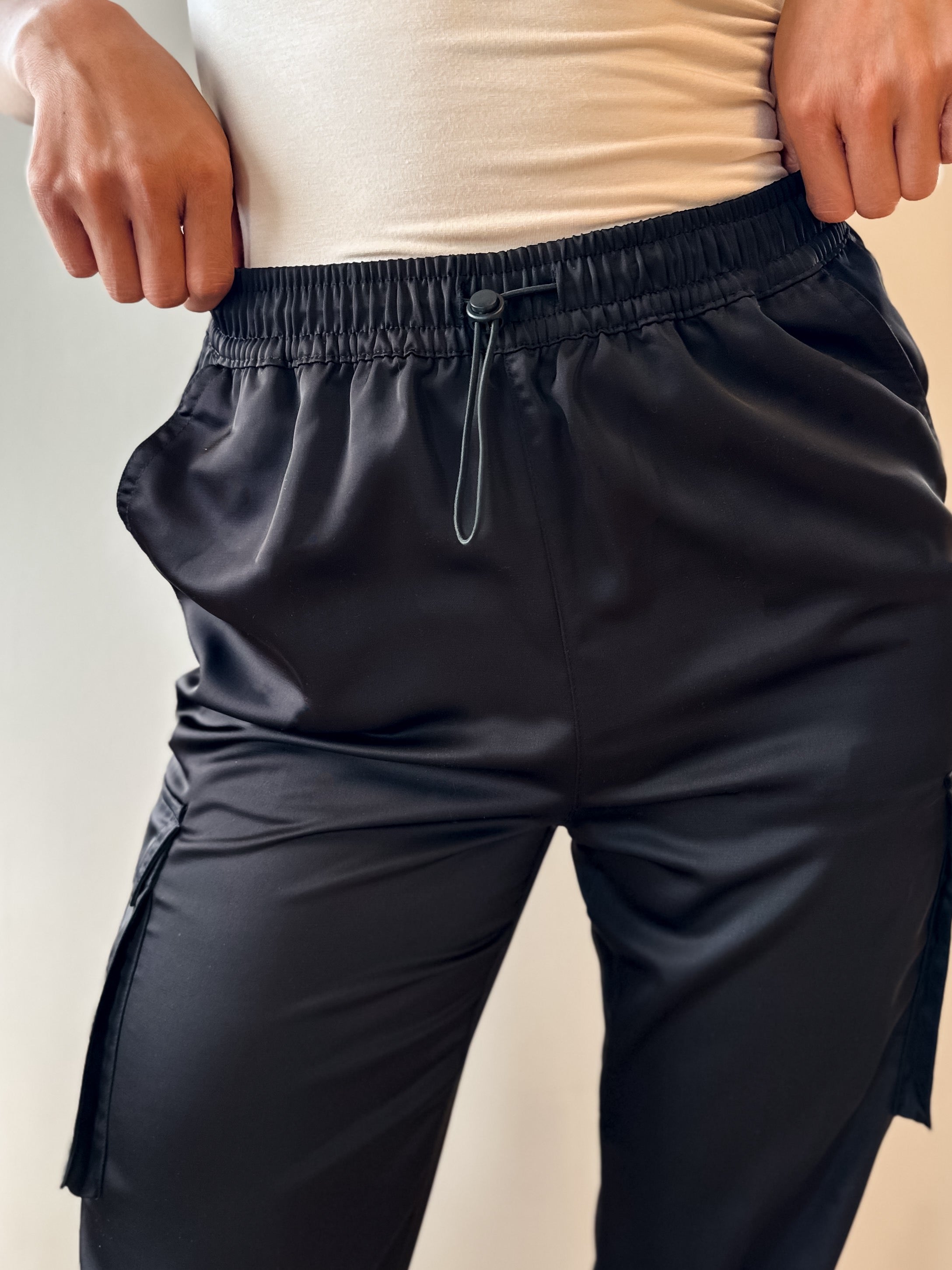 black satin drawstring joggers with elastic waistband