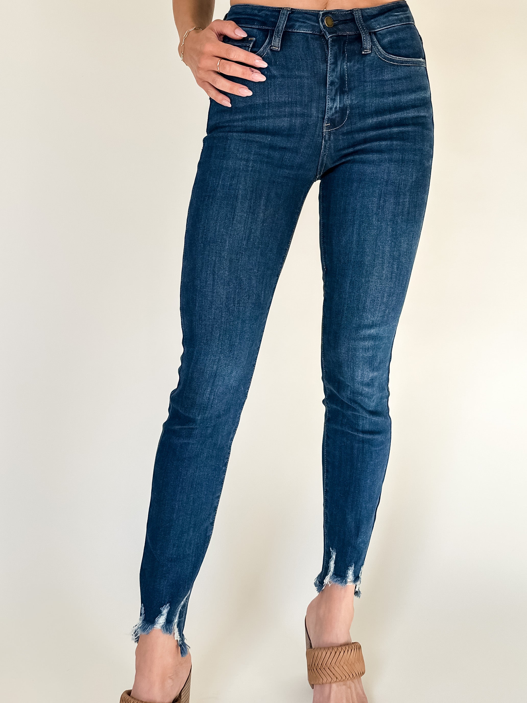 dark wash super skinny jeans with frayed hem