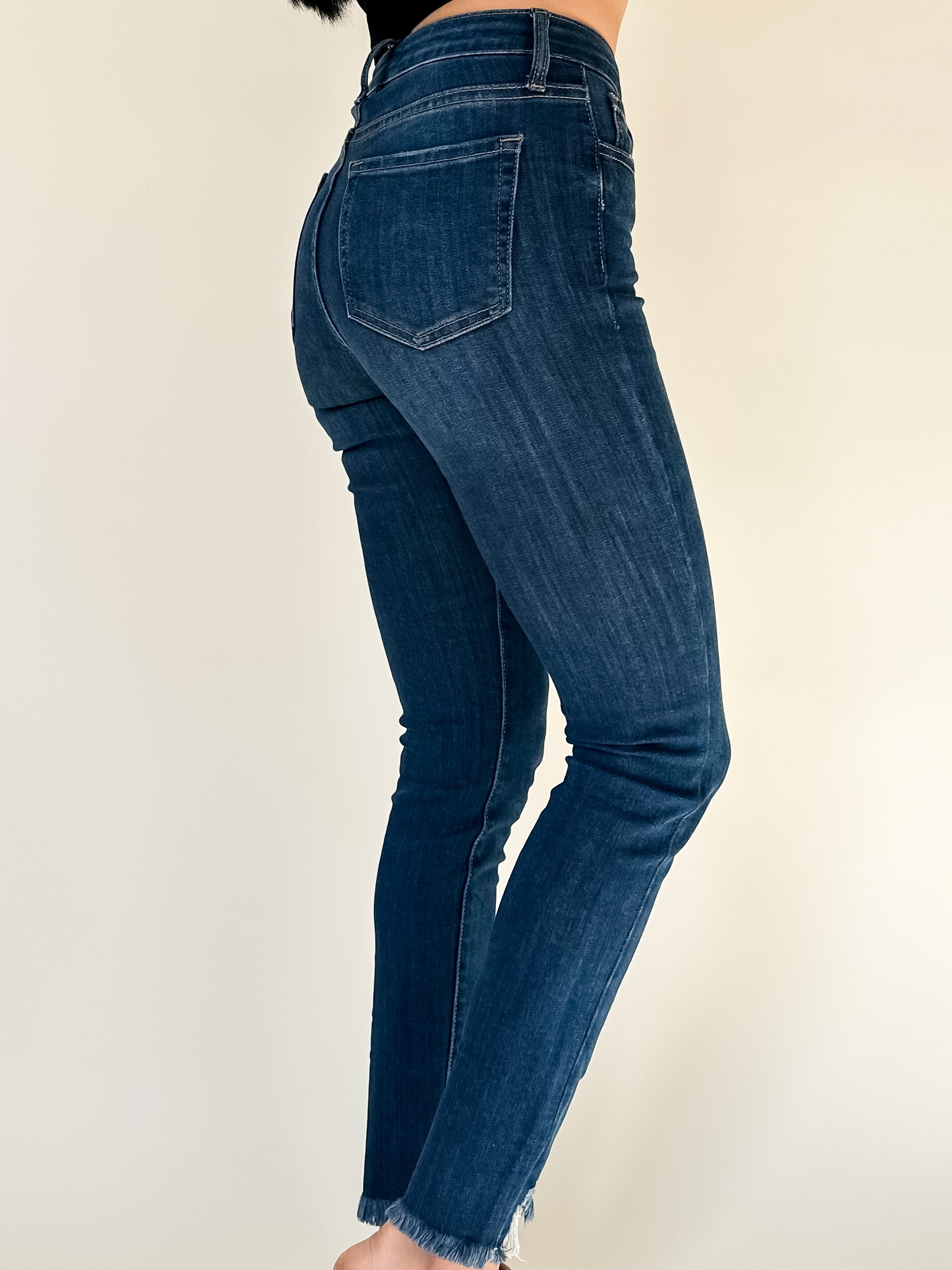 dark wash super skinny jeans with frayed hem