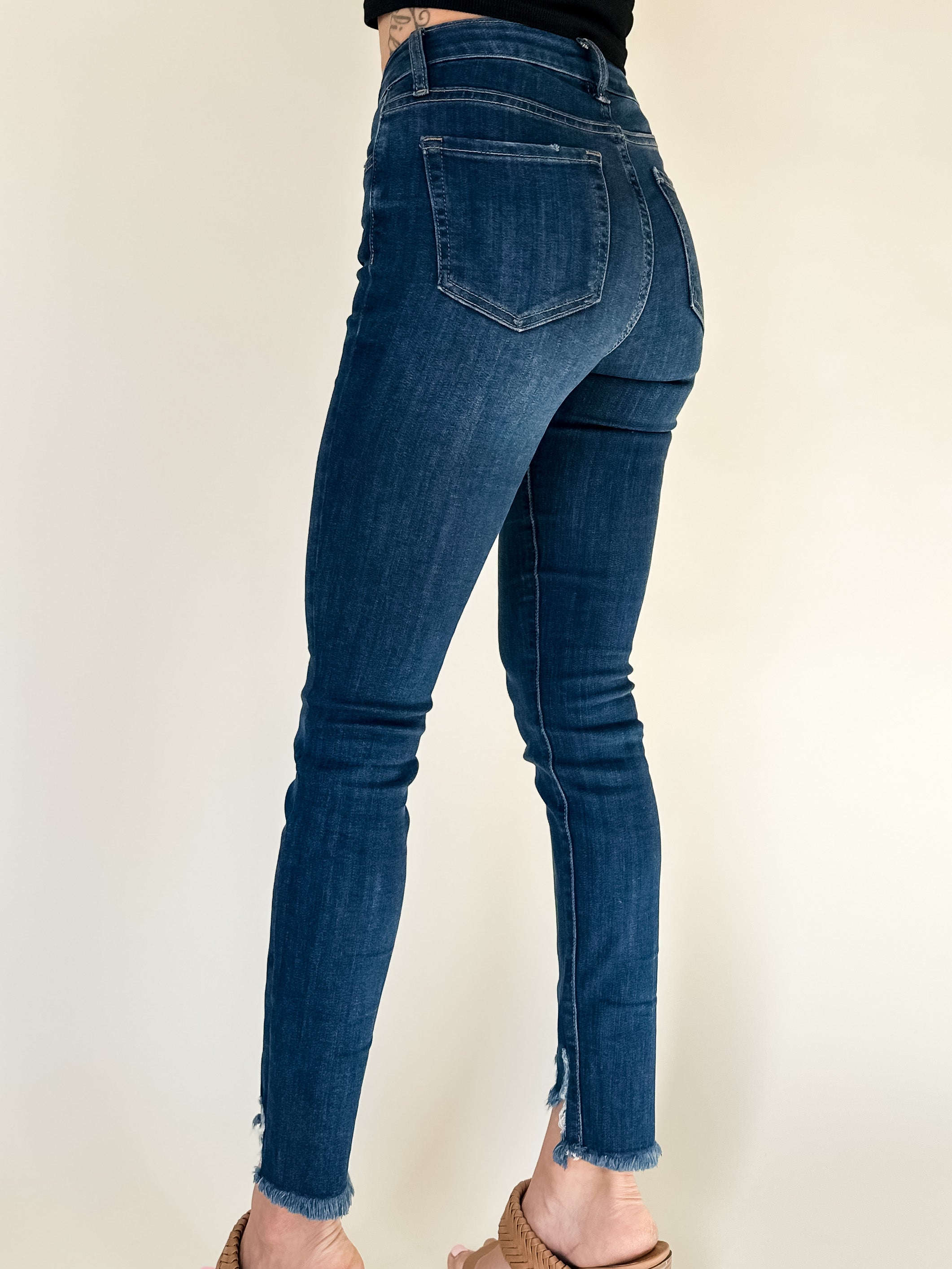 dark wash super skinny jeans with frayed hem