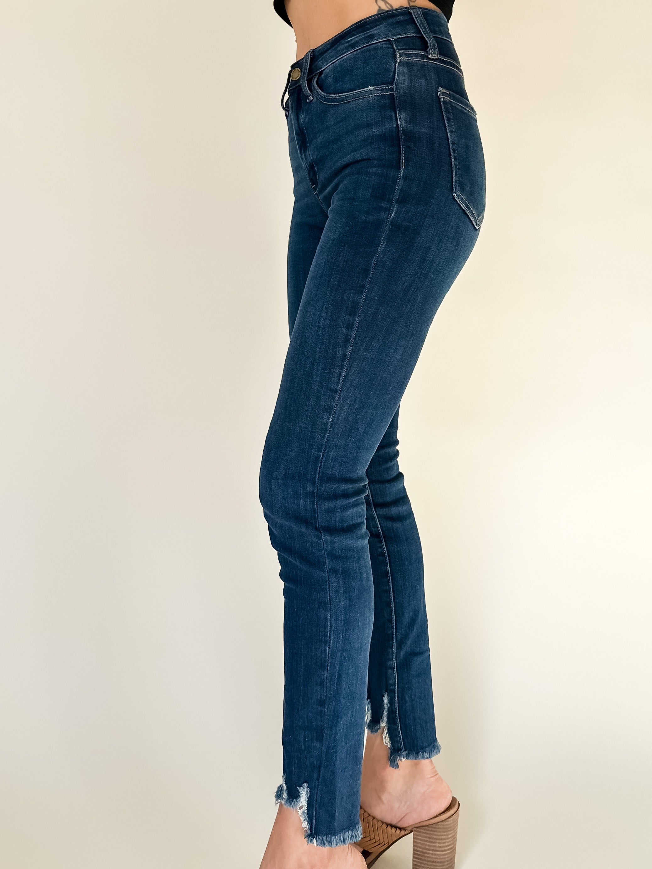 dark wash super skinny jeans with frayed hem